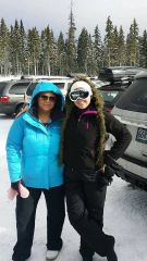 I'm the one in the blue coat, snowboarding again!