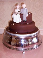 chocolate wedding cake with fondant people