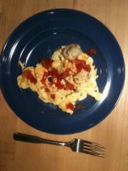 2 eggs, some shredded cheddar cheese, 6 mushroom slices and some salsa