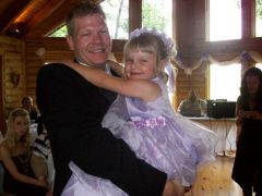 My son-in-law and my granddaughter,(very pretty flower girl)