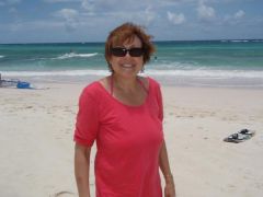 Me a year after the operation maxing it in Barbados. I am so happy now!