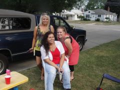 My sister, my cousin and me sitting down