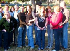 Some of my extended family. I'm the one in green. FML for that pose, lol!