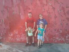 My husband, Stan, our grandkids, and I at the lighthouse in Muskegon, MI.