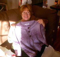 Me and one of my presents a normal sized sweater LOL
