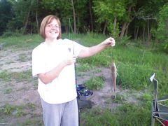 My hubby took this picture with my cell phone, so quality is not grand, but when I saw myself, I couldn't believe it was me.  We were out fishing for catfish on the river.  Obviously that is not a catfish...small walleye.  We had a great time.