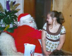 Cierra, sitting on Santa's lap after our little church's hugely successful Christmas cantata.