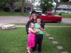 My kids and I on my graduation day.