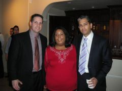 Christmas Party '08. This is me standing between my bariatric surgeon, Dr. Goyal (right), and Dr. Forrester (left), who works with my doctor and is also a bariatric surgeon.  They're both so darned good looking! Ain't I a lucky Gal? :)
