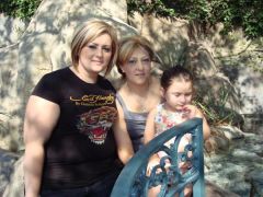 me 3 months prior to surgery in disneyland with my daughter and Aunt