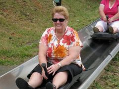 Kathy on the toboggan ride at the Big Banana