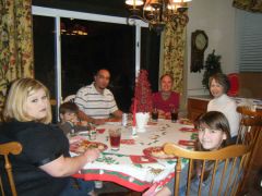 Me on the left with my husband, kids, and parents on Christmas Eve 2008