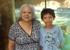 Me and my 7yr old nephew at the zoo - July 12, 2008. 6 months and 53.5 pounds gone.