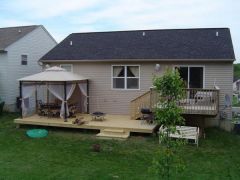 2008 I took a week off of work to build a deck onto my house...even fat guys build decks I guess :D