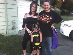 Me my 16 year old sister and my daughter Batgirl!! on Halloween.