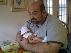 About 370, Holding my Grandaughter