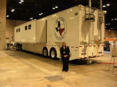 This is me at the TX Homeland Security Conference in front of the Gov. Emergency Mngt Mobile Operations Vehicle