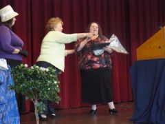 Winning the top award at the Women of achievement awards banquet on 10/11/08.  Full body shot.