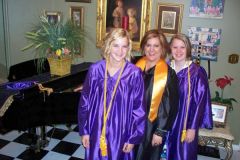 me & my twin nieces graduation 2008. Their high school, my college.