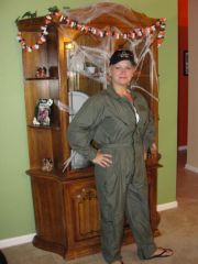 Me rocking my hubby's flight suit at a halloween party :) and it was big on me thats the best part !!