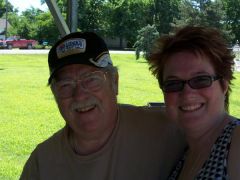 This is me and Daddy at family reunion this year.  Not my best hair day, but oh well.  It was windy outside......yeah that's it.  :)