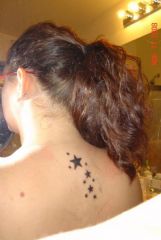 MY TATTOO: Stars on my back, my first tattoo! It reps me, my 2 boys, and the other 7 most important ppl in my life!!! Still my fav tattoo!