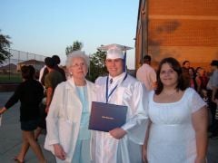 Brother, Tyler's graduation a year ago. Him, grandma, and myself.