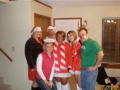 Going on a Santa Pub Crawl. In the middle with the scarf with the "boots with the fuuuur" lol