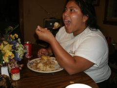 Me eating at my sister b-day dinner.