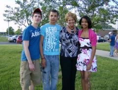 My kids and me at my daughters 8th grade grad. I am about 84 lbs down here.