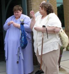 I'm the one in Lilac. My oldest sister Dianne is blowing bubbles next to me. She's been battling her insurance company and has encountered several delays in getting banded.