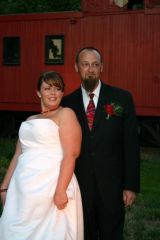 My wedding 9/2006 - 205 lbs

I had just lost 90 pounds in the two years before, got down to 190, then gained 15 right before the wedding. Had to have my dress let out a week before.