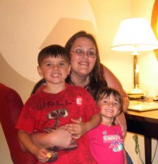 Me... with my nephew and niece in June 2009