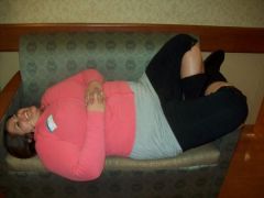 lol. laying on the couch at the hospital waiting for my niece's arrival! i look like  my fat is gonna choke me out.