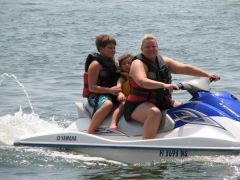 The smile was totally fake. I was completely humiliated trying to get on this thing because the jet-ski workers made me get on it myself in 4 feet of water. They wouldnt help me and I kept slipping off. There were around 10 people watching me try to board