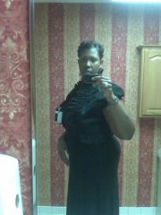 9 weeks post 9-20-22010.  Bathroom pic in my black dress.  side view