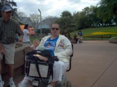 I hate this picture so much, here I am at the happiest place on Earth and I'm having to ride on a cart cause of my back