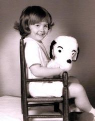 Jennifer in family chair 4 years old studio portrait