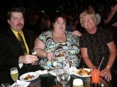 Me in the middle with my husband and his aunt on a cruise.