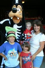 Disney Halloween 10/08
Me with Goofy and all my kids at Disneyland. I am not afraid of semi full length pics anymore...yay! oh and I wore shorts for the first time in public in years. Losing almost 60lbs is feeling pretty cool!!!!
