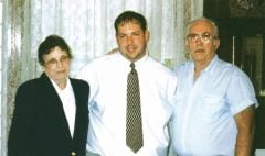 Me with my parents in 2001. This is one of the last photos of my mom before she died of breast cancer. (About 290lbs)