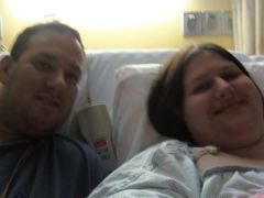 The night of my surgery..Me and the hubby in my huge hospital bed for two. We were both laying there watching TV it was an insanely huge bed..