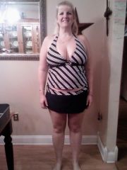 my new tankini 107.5 pounds lost 2/17/09 my boobs are the same size.. lighting makes them look way different lol