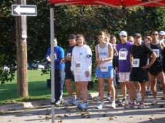 Here I am at the starting line. I'm beside the tall woman who really looks like a runner! She ran and finished 1st with a time of 20 min.