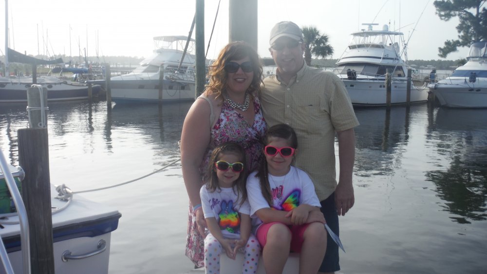 Whole family on the dolphin boat dock.jpg